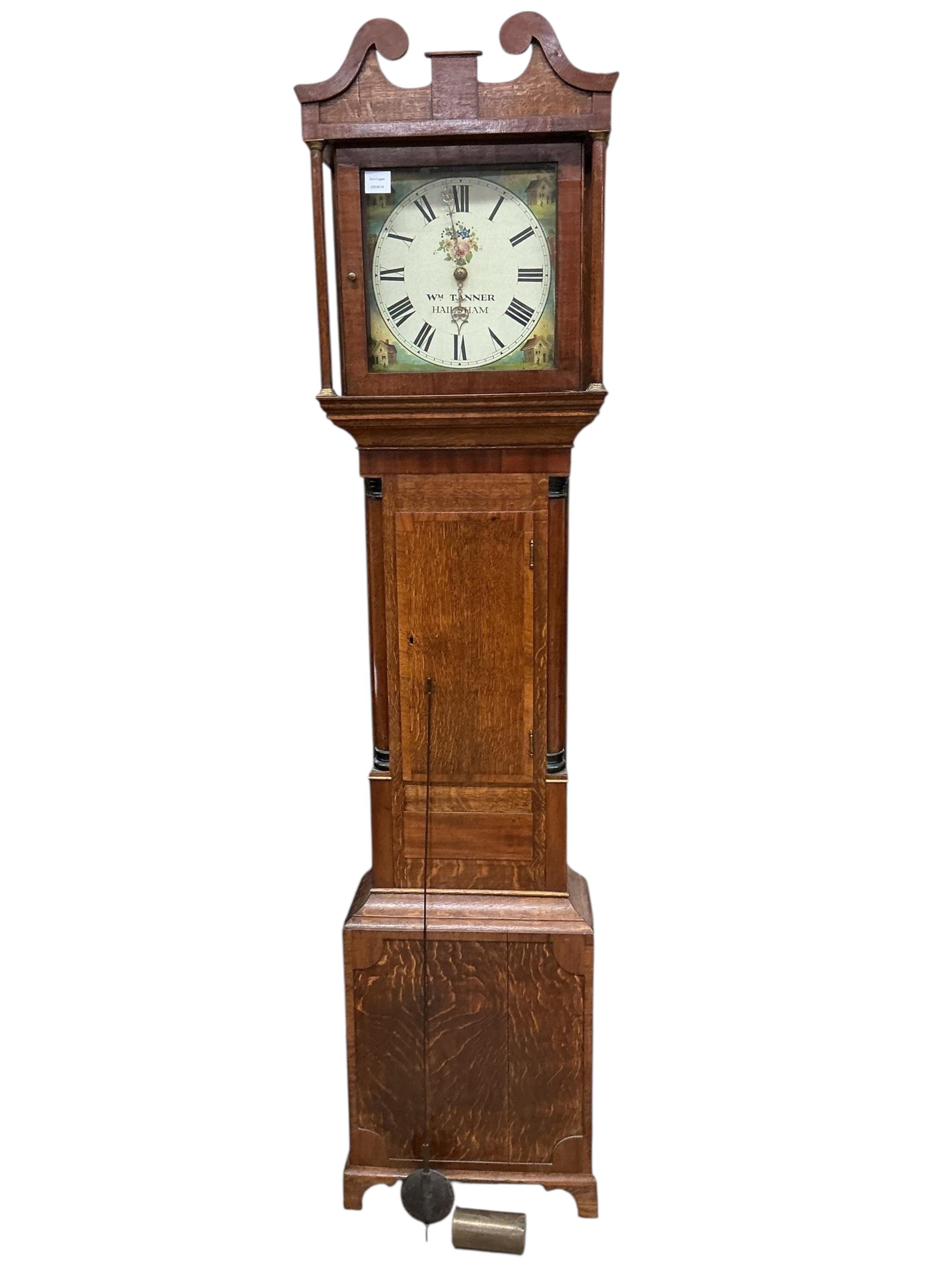 An early 19th century banded oak thirty hour oak longcase clock, marked Wm. Tanner, Hailsham, height 205cm